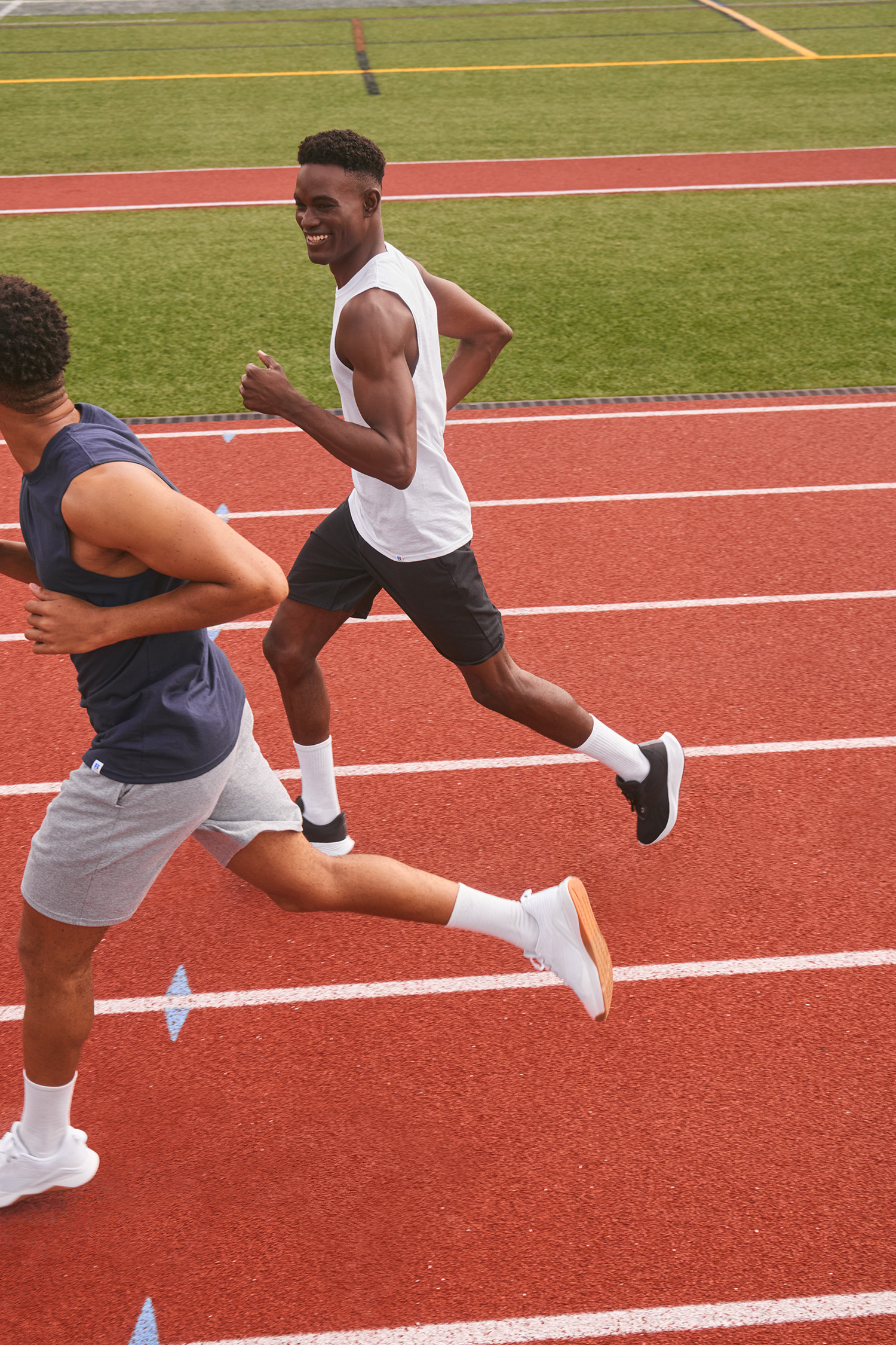 Russell Athletic brand campaign photography by The Charles Group highlighting athletic performance and heritage apparel