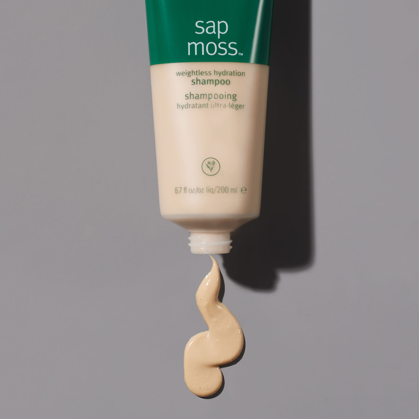 Aveda Sap Moss social post with performance claim copy and editorial design, by The Charles Group