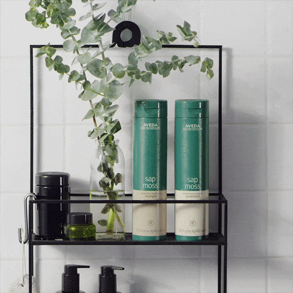 Aveda Sap Moss animated digital ad revealing sustainability messaging on dark background, by The Charles Group