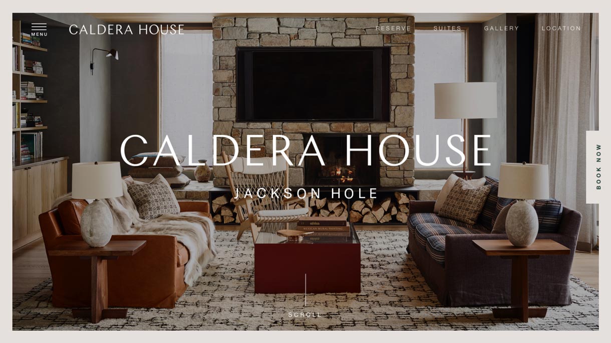 Caldera House Jackson Hole website homepage showing stone fireplace lounge with leather sofas and Book Now CTA