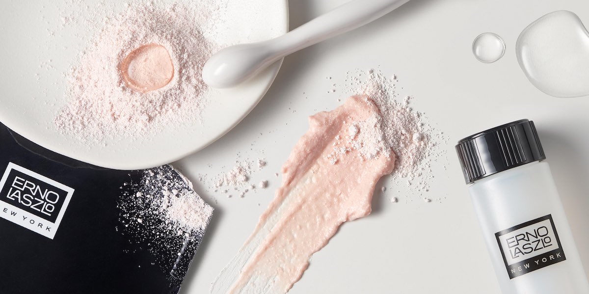 Erno Laszlo cleansing powder flatlay with product packaging and cream swatches