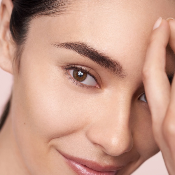 Close-up of model's eye and brow highlighting the under-eye area for Erno Laszlo eye gel cream campaign