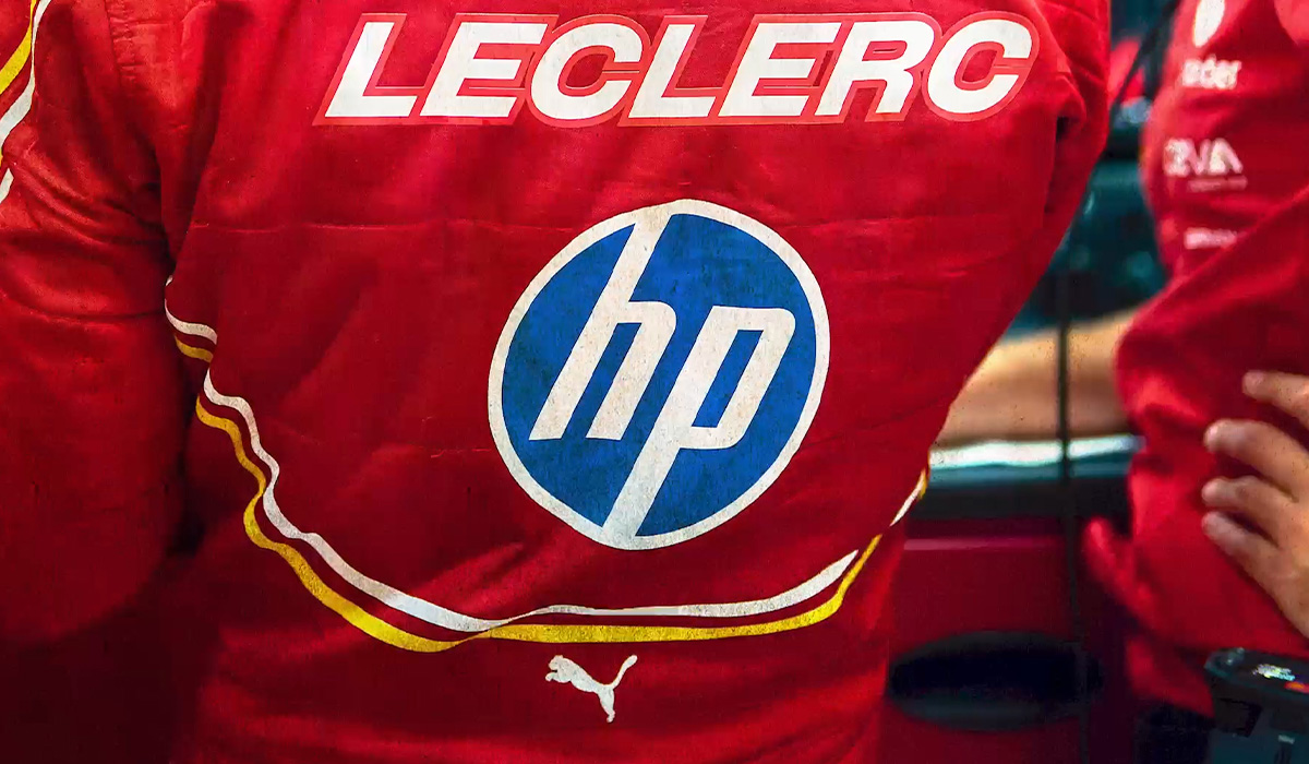 Ferrari F1 racing suit with HP logo on the back, worn by driver Leclerc