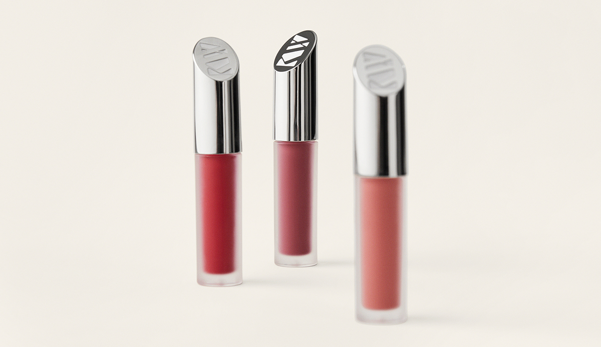 Second Kjaer Weis still life product shot from The Charles Group's beauty campaign, styled with organic natural elements