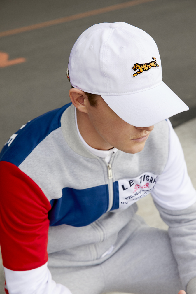 Male model in Le Tigre polo shirt in studio campaign photography by The Charles Group