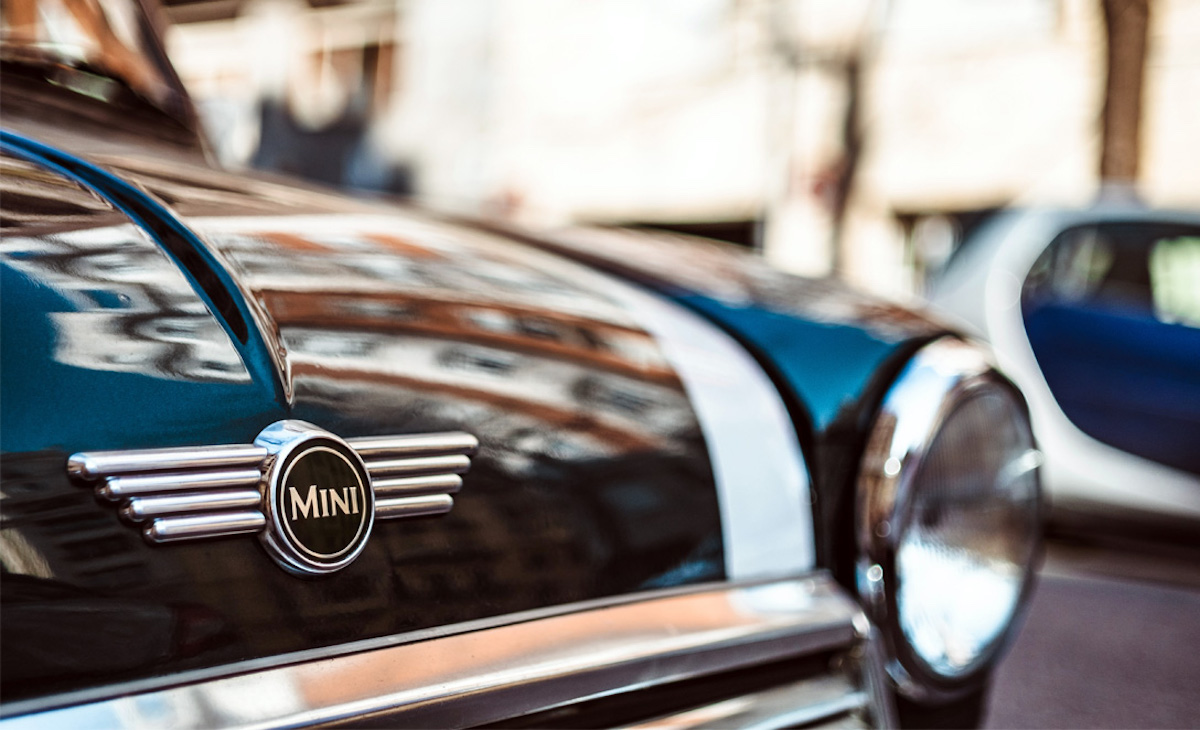 Close-up of a MINI USA car bonnet badge, hero image for The Charles Group's Defy Hunger Together digital campaign