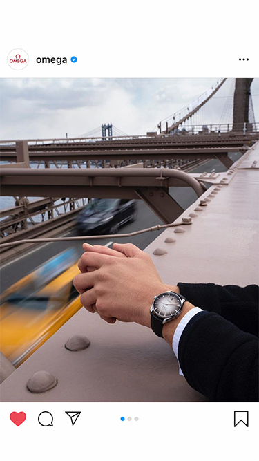 Omega holiday social media post with watch close-up and seasonal messaging, by The Charles Group