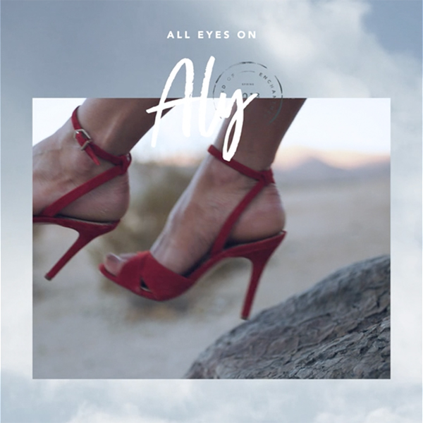 Close-up Instagram post of Sam Edelman Aly red strappy heeled sandal on rocky desert terrain, created by The Charles Group
