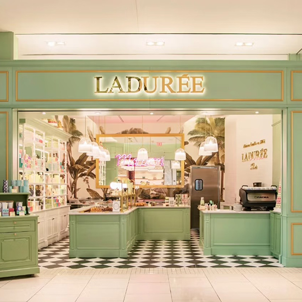 Ladurée boutique inside Turnberry's Aventura Mall, showcasing The Charles Group's luxury retail and hospitality marketing