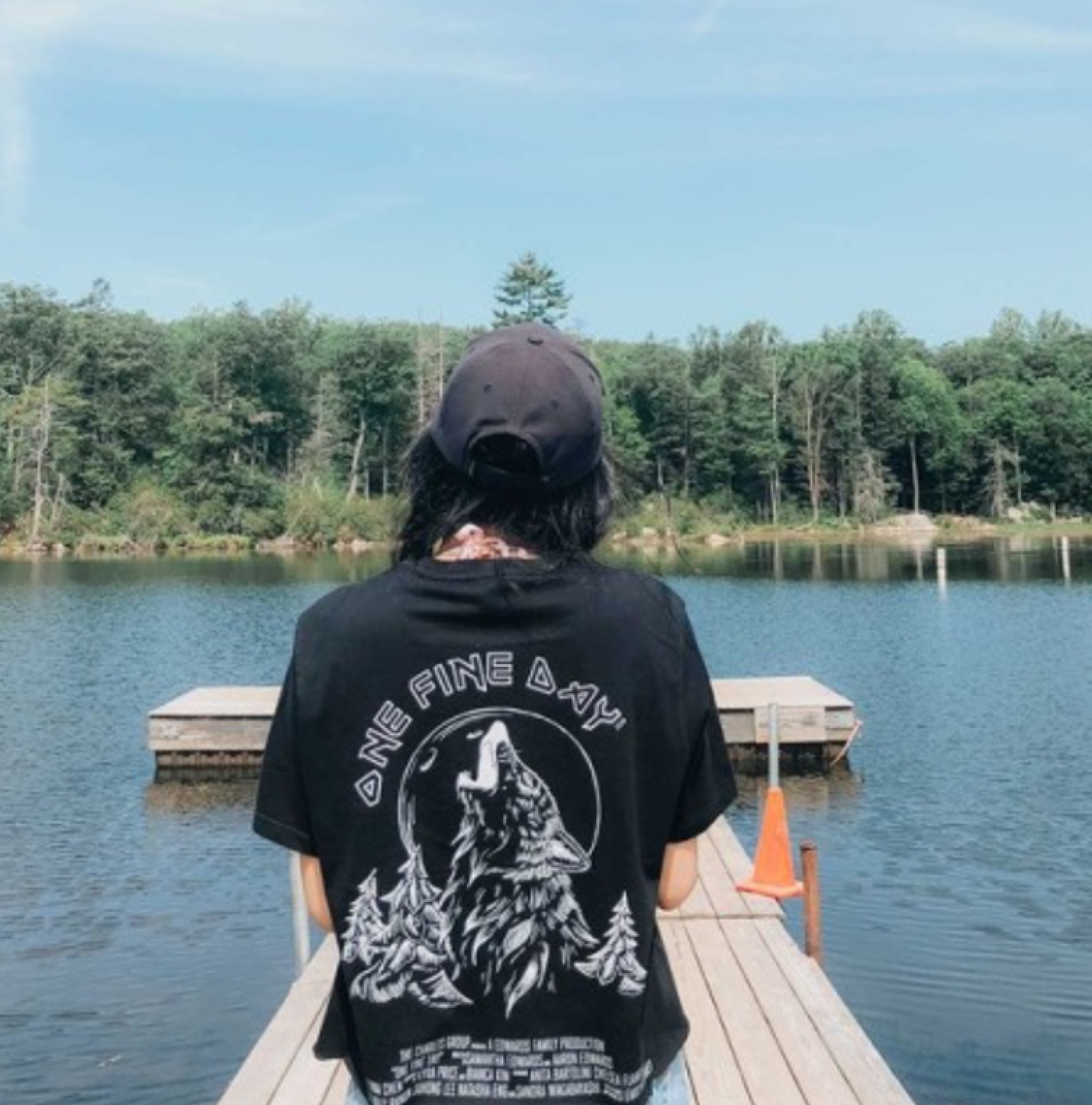 The Charles Group team member on a dock during an offsite retreat